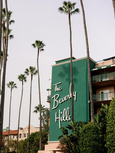 Outside view of the Beverly Hills Hotel during a wedding celebration.