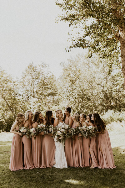 bride posing with her bridal party