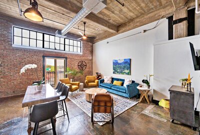 Exposed brick, open beam ceilings and great views of downtown Waco make this 4-bedroom, 2-bathroom vacation rental condo a great choice!