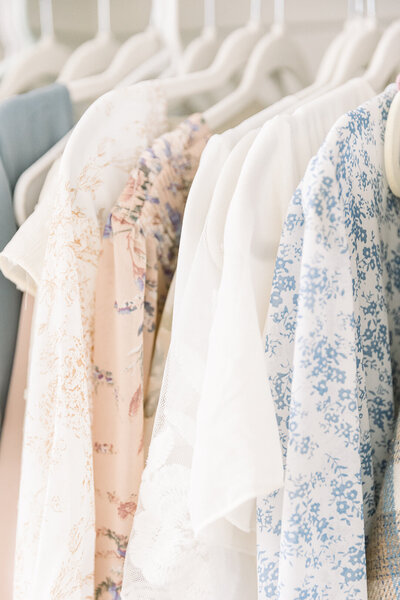 image of client closet dresses in soft pale colors taken by Newborn Photographer Sacramento Kelsey Krall