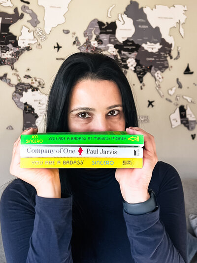 photo of the brand photographer holding her  favorite  books