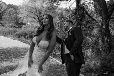 groom touching bride's back