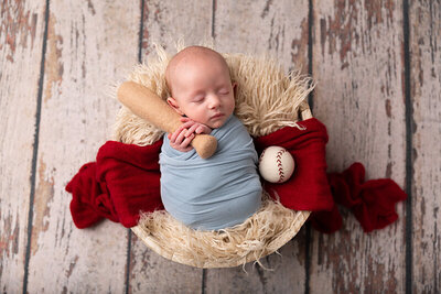 baby dressed like baseball player by Philadelphia Newborn Photographer