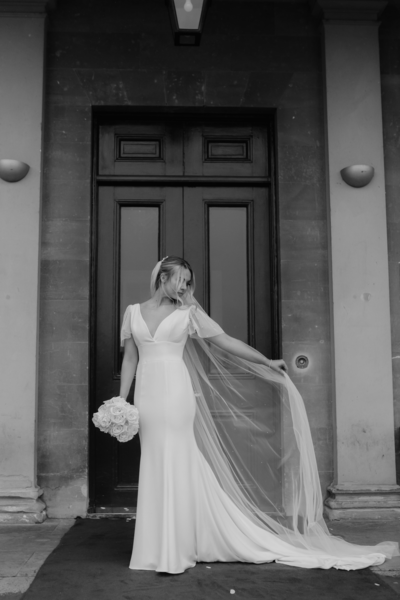 Rudding Park Harrogate stately house bride with sophisticated dress and veil with single type white rose bridal bouquet