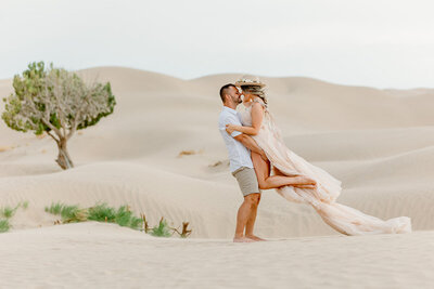 utah engagement photo with dress kissing