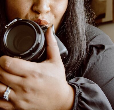 woman kissing camera