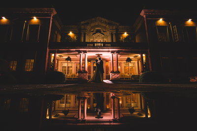 a dramatic wedding photo taken at night at eaves hall lancashire