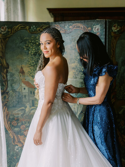 bride and mom button wedding gown