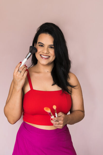brand photo of a make up artist with makeup brush
