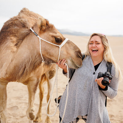 Colorado elopement photographer with her dog Cosmo, capturing fun and authentic love stories