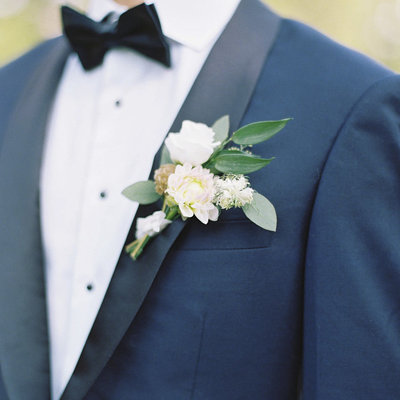 Maine Groom In Navy Suit with Simple White Boutineer