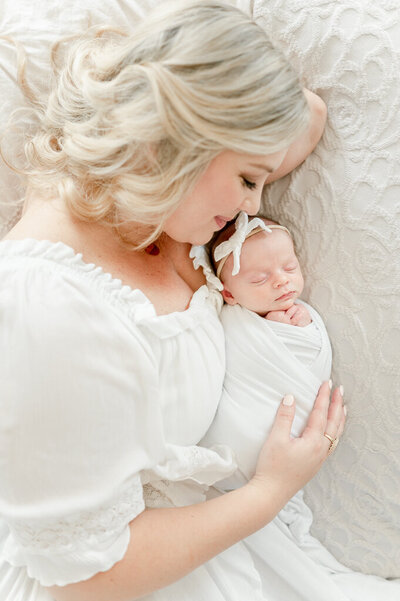 bother kissing new siblings head by Nashville Newborn Photographer Kristie Lloyd