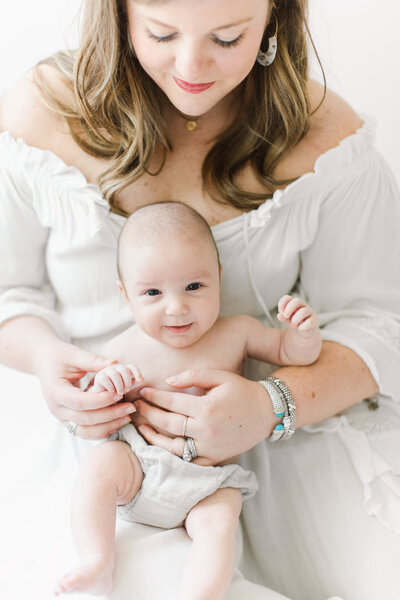 3 month milestone photo session with smiling baby in Arkansas.