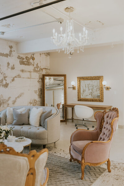 Luxury chairs, mirrors and chandeliers in the bridal suite at the St Vrain