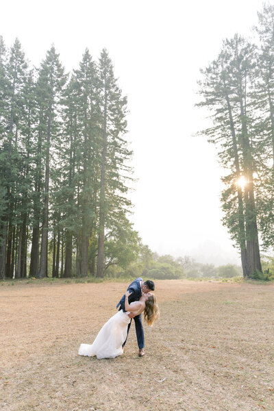 Bay Area couple  kissing on wedding day