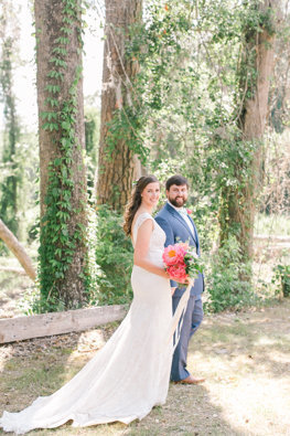 Meredith Jamison Photography Wedding Photographers In Columbia Sc Bride And Groom In Forest At Adam S Pond Columbia Sc Smiling With Bouquet