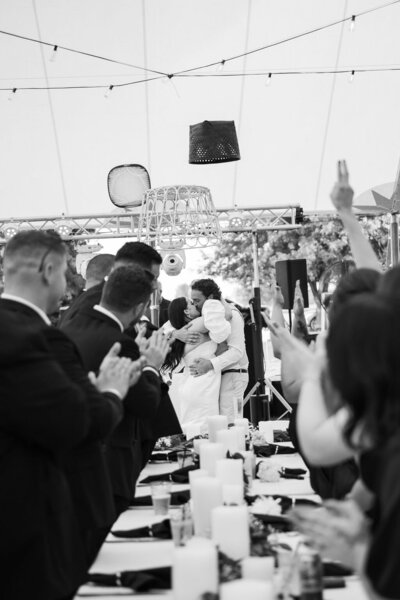 bride and groom's first dance at backyard wedding in Almont Michigan
