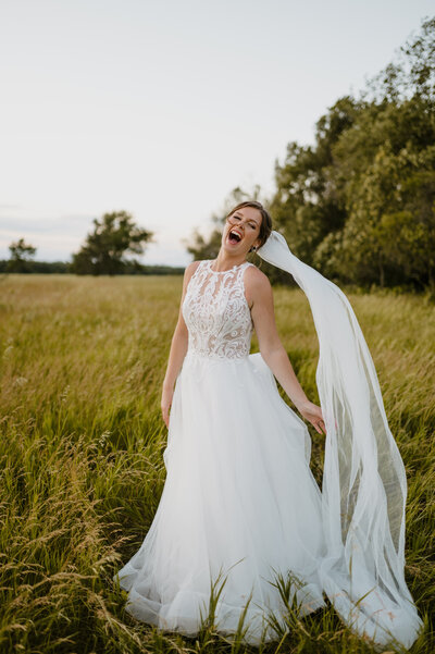 Bride laughing wedding
