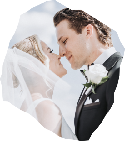 Smiling bride and groom about to kiss in close up photo - professional photo edit by Uncut Gems