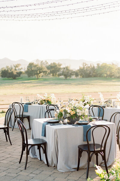Outdoor wedding reception tables