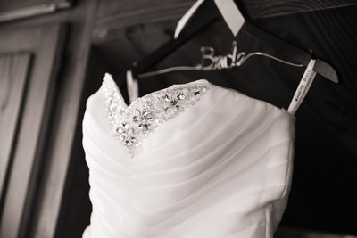 Wedding dress on hanger. Photo by Ross Photography, Trinidad, W.I..