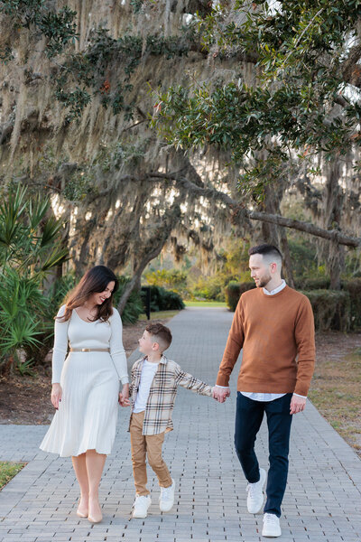 Family of four pose along the bike trails of the beautiful Starkey Ranch neighborhood in Odessa, Fl.
