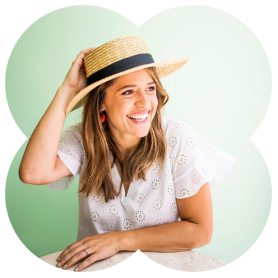 amie stockstill in hat with green background