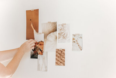 warm mood board with hands on a wall