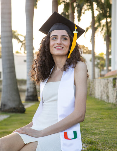 College graduate posing and smiling