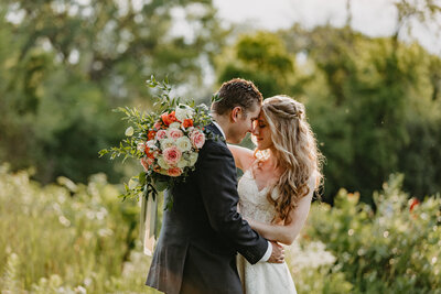 wedding portrait with couple closing their eyes and soaking in the moment