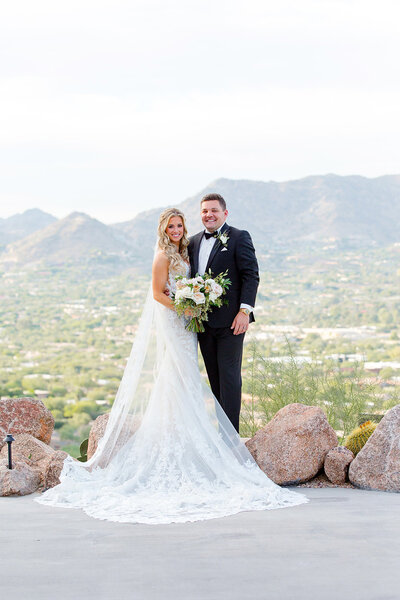 bride and groom with Arizona landscape
