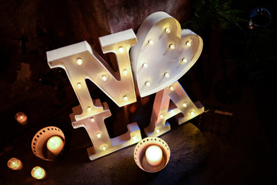 NOLA custom metal lighted sign at Race and Religious New Orleans Wedding
