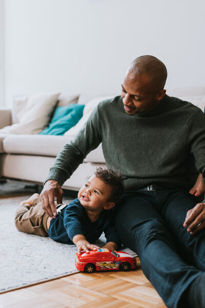 black father with son in home photography