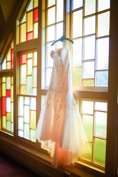 Bridal Gown on Stained glass at Mississippi Wedding