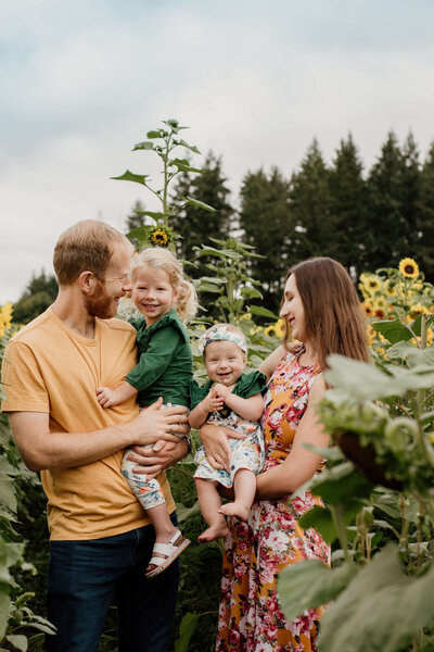 family in a sunflower field