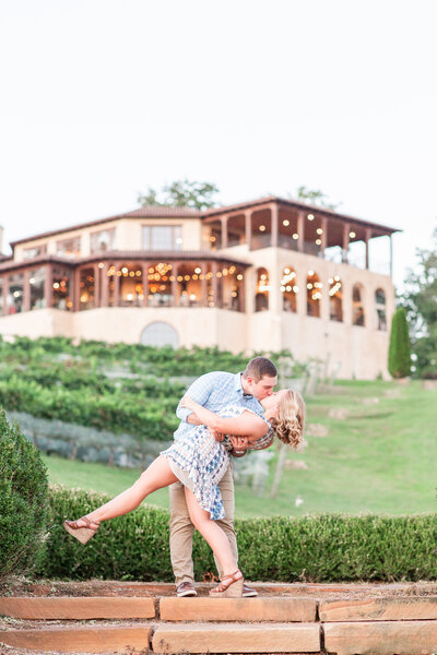 Photo of a couple kissing and dipping at Montaluce Winery in Dahlonega Georgia.