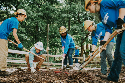 volunteers digging
