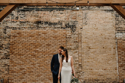 couple at mercantile hall in midwest wedding