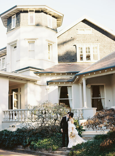 Bride and groom walk up memorial steps at their DC wedding