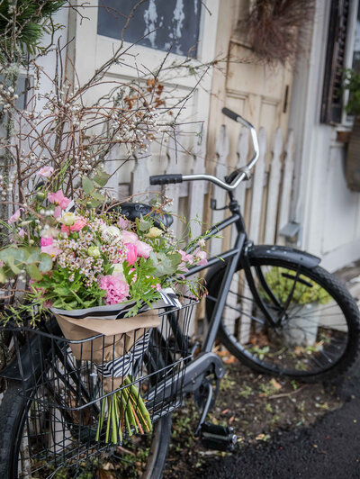 Nancy Ingersoll loves her bike and fresh flowers, so she took this photo for a local florist's brand photography styled shoot