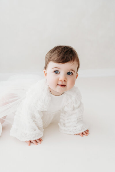 Beautiful baby girl turning one on her photoshoot