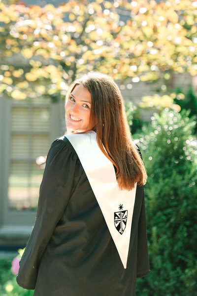 Fenwick high school cap and gown photos at a backyard photoshoot