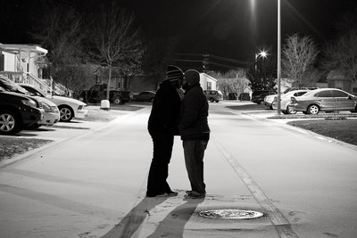 David Castillo and Irene Castillo of Expose The Heart Photography kissing in the snow