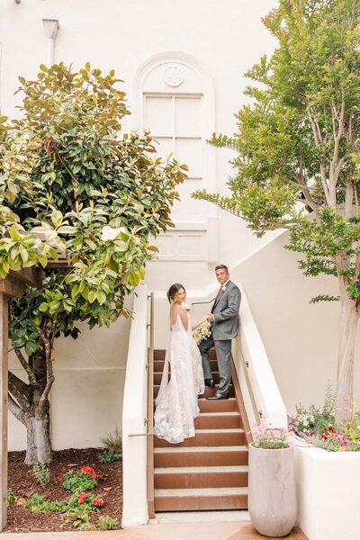 Bride and groom on steps