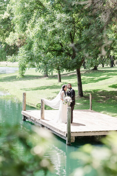 Wolf Lake Park Phoung & Trevor Wedding on a dock