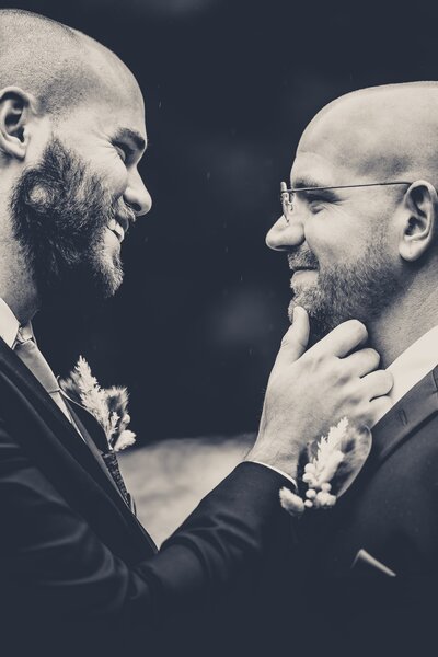 Captured in the serene settings of West Baden Springs Resort, John and Mike share a spontaneous laugh, embodying the joy and authenticity of their wedding celebration.