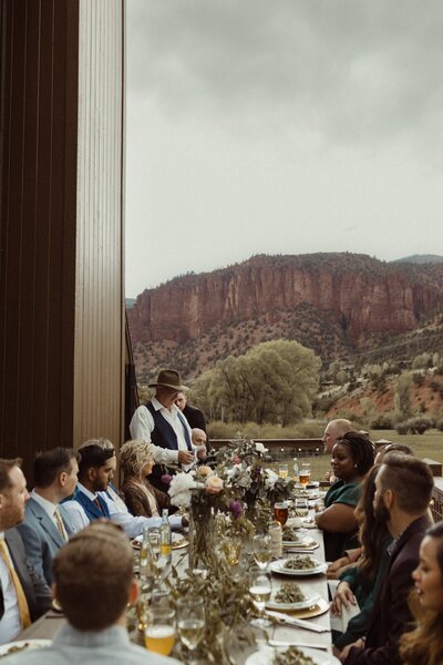 An intimate wedding in colorado concluding with a dinner on the deck of an A-Frame in Aspen