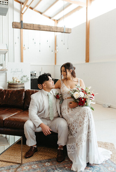 couple on lounge furniture at ansas City wedding editorial