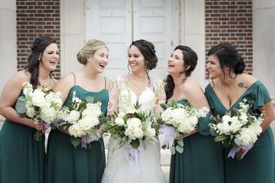 South Carolina bride with bridesmaids wearing emerald green