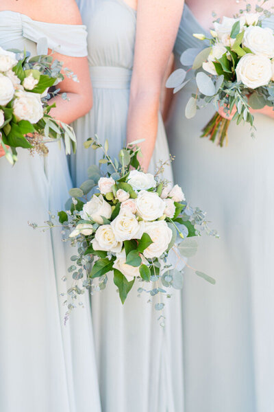 sage green bridesmaid dresses with neutral bouquets